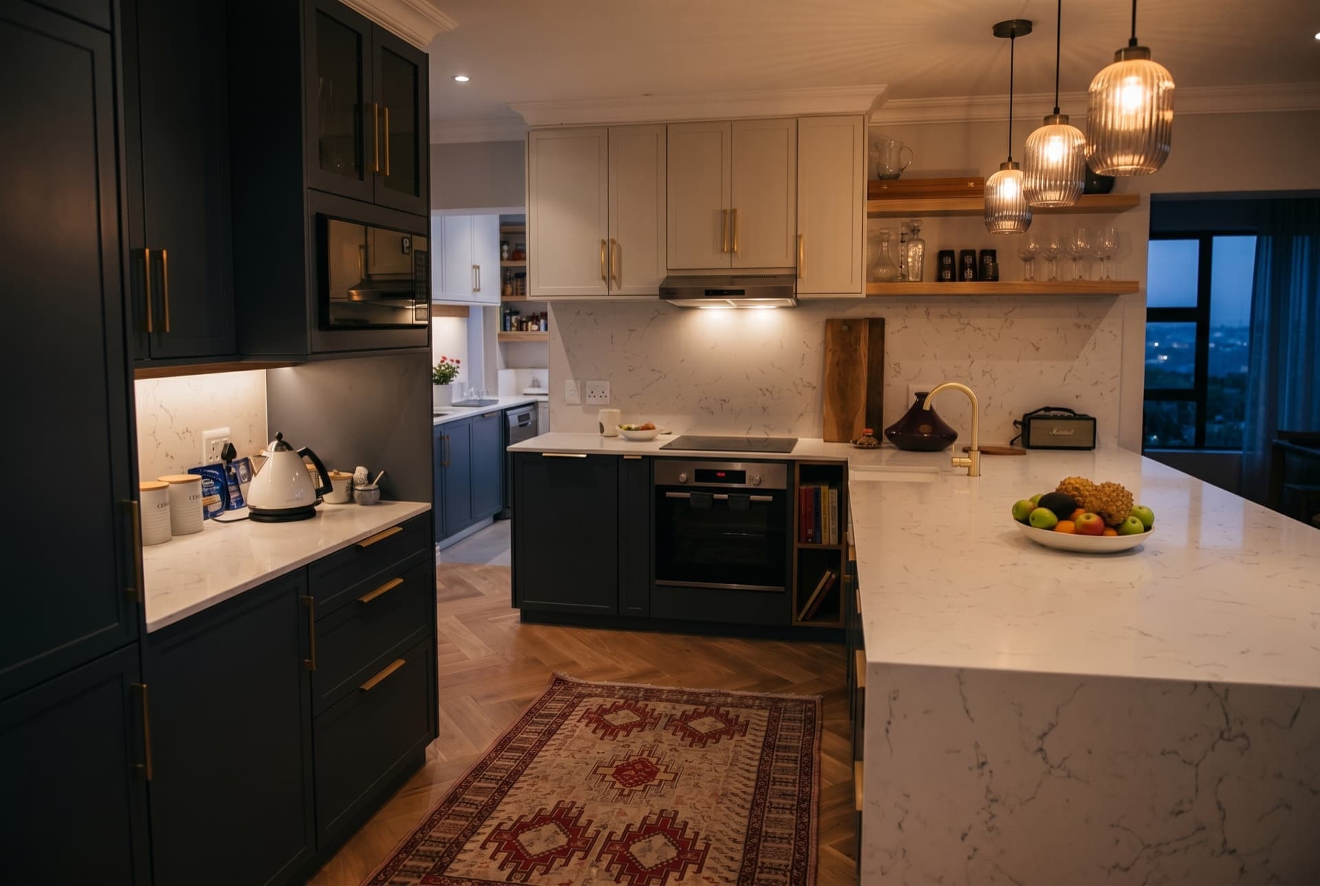 Stonehurst — the kitchen and its marble island at dusk