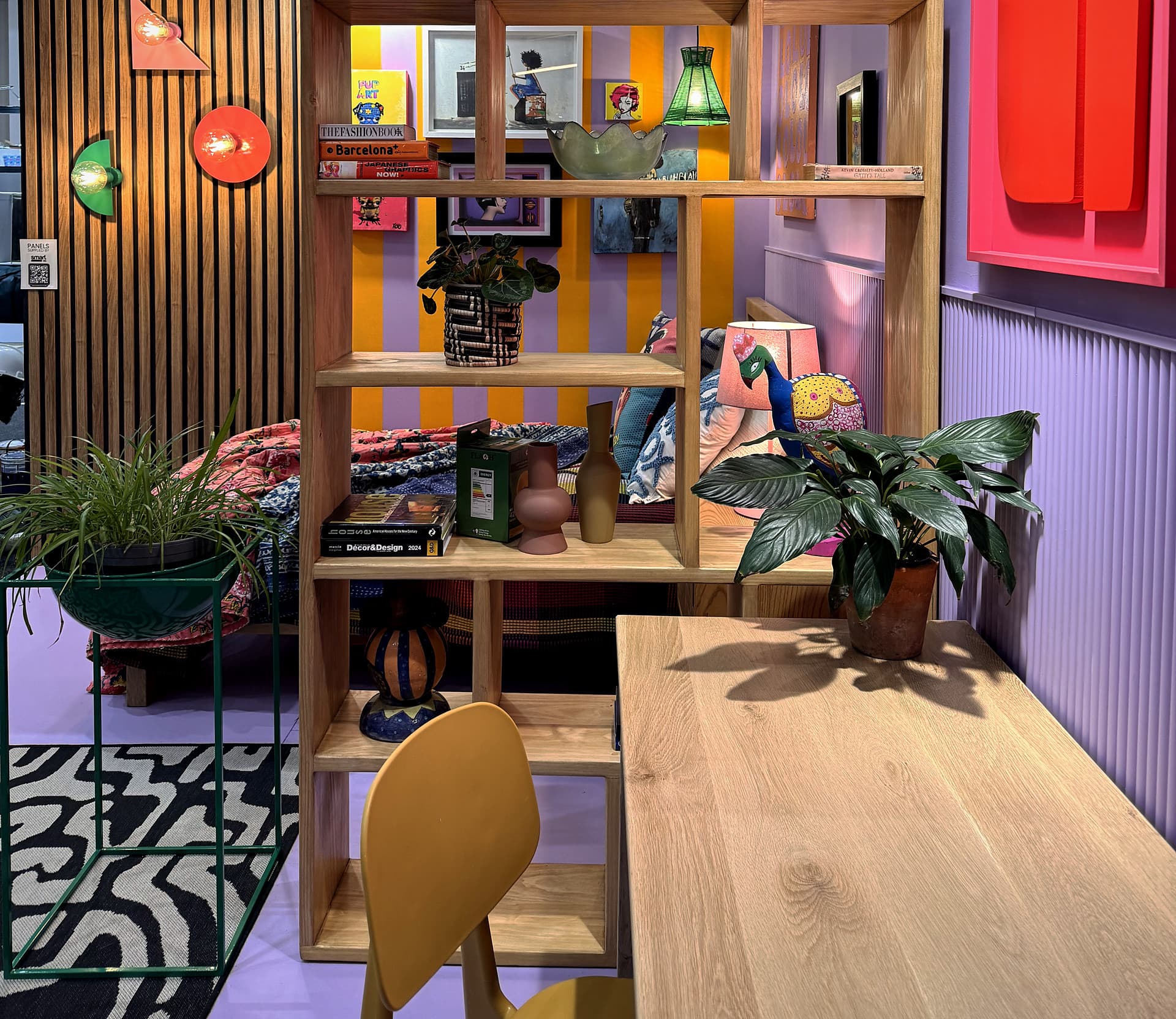 Urban Living Pod – Oak shelving unit, desk and a red relief panel on the wall